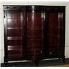 Image 1 : Mahogany triple glass door bookcase; applied swag