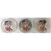 Image 1 : THREE COLORIZED AMERICAN SILVER EAGLES
