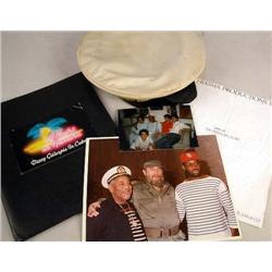 DIZZY GILLESPIE'S NAVAL OFFICER'S CAP Stained and worn, together with a group of photos showing Dizz