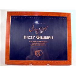 A GREAT ARTISTS OF OUR TIME PLAQUE Affixed to wood plaque, presented to "Dizzy Gillespie for your Co