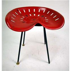 A RED PAINTED METAL SEAT Dizzy's seat, losses and wear, 19"h x 18"w x 14"d