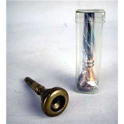 A GIARDINELLI NEW YORK BRASS TRUMPET MOUTHPIECE Together with a silver plated Jet Tone Al Hirt model