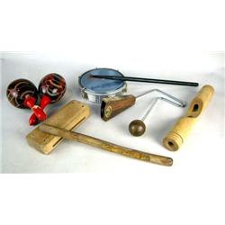 A WOOD AND CHROME VIBRA-SLAP Together with a wood block with stick, maracas, a frame drum with stick