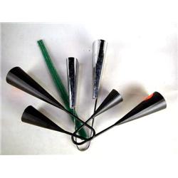 THREE AGOGOS Two black, one silvered, together with a green plastic rhythm stick, some wear, 4 piece
