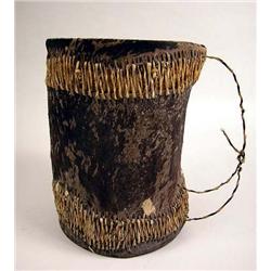 A HAND CARVED AND HAND MADE SKIN DRUM The underside fitted with a sticker saying "Made in Kenya", 14