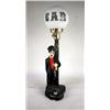 Image 1 : A CHARLIE CHAPLIN PAINTED BAR LAMP Losses, together with a 35mm photo depicting Dizzy and a partiall