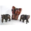 Image 1 : A PLASTER CAST AFRICAN WOMAN RELIEF Together with a pair of carved Rosewood elephants
