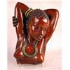 Image 2 : A PLASTER CAST AFRICAN WOMAN RELIEF Together with a pair of carved Rosewood elephants