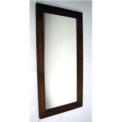 AN OAK FRAMED LOOKING GLASS Some wear, 36"h x 18"w