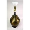 Image 4 : A LARGE BRASS LAMP WTH STRING SHADE Together with a round Oriental design black top brass table on t