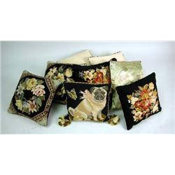 A GROUP OF EIGHT ASSORTED THROW PILLOWS Comprising five needlepoint, one oriental style, and two wit
