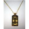 Image 1 : A 14K YELLOW GOLD INGOT PENDANT SUSPENDED FROM A GOLD CHAIN Apx. 20.7 dwt.