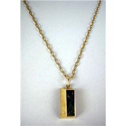 A 14K YELLOW GOLD CARTIER INGOT SUSPENDED FROM A GOLD CHAIN Apx. 26.5 dwt.
