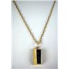 Image 1 : A 14K YELLOW GOLD CARTIER INGOT SUSPENDED FROM A GOLD CHAIN Apx. 26.5 dwt.