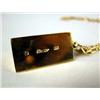 Image 4 : A 14K YELLOW GOLD CARTIER INGOT SUSPENDED FROM A GOLD CHAIN Apx. 26.5 dwt.
