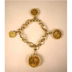 A 14K YELLOW GOLD LINK CHARM BRACELET WITH FOUR GOLD COIN CHARMS Apx. 44 dwt.