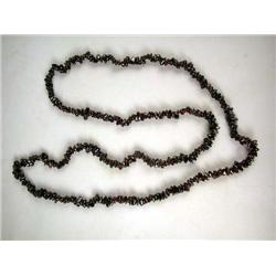 A TUMBLED GARNET BEADED NECKLACE 34"l