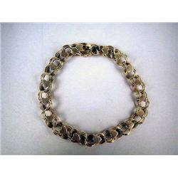 A 14K YELLOW GOLD CHARM BRACELET WITH HEART LINKS Apx. 6.6 dwt.