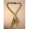 Image 2 : A 14K YELLOW GOLD CHARM BRACELET WITH DOUBLE HANGING FISH PENDANTS Apx. 14.5 dwt.