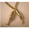 Image 3 : A 14K YELLOW GOLD CHARM BRACELET WITH DOUBLE HANGING FISH PENDANTS Apx. 14.5 dwt.