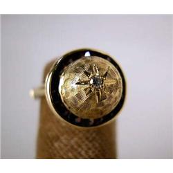 A 14K YELLOW GOLD AND GARNET RING WITH GOLD BALL CENTER Apx. 3 dwt.