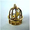 Image 1 : A 14K YELLOW GOLD BIRDCAGE CHARM A 14K YELLOW GOLD BIRDCAGE CHARM;