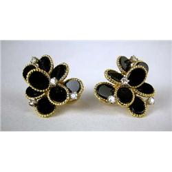 A PAIR OF 14K YELLOW GOLD, ONYX, AND DIAMOND EARRINGS In a floral design set with sixteen flat oval 