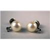 Image 1 : A PAIR OF 14K WHITE GOLD AND CULTURED PEARL EARRINGS Each set with a circular diamond, pearls apx. 7