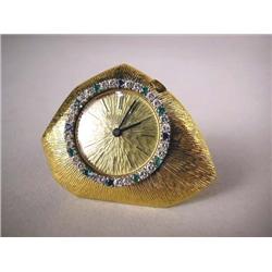 AN 18K YELLOW GOLD PATEK PHILLIPPE TRAVEL STAND W