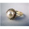 Image 1 : A 14K WHITE GOLD, PEARL, AND DIAMOND RING With one cultured pearl, apx. 6.60 mm, and twenty single c