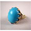 Image 1 : A 14K YELLOW GOLD AND TURQUOISE OVAL CABOCHON RING Apx. weight 4.90 dwt.