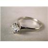 Image 1 : A 18K WHITE GOLD AND DIAMOND ENGAGEMENT RING With a round brilliant cut diamond, weighing apx. 1.05 