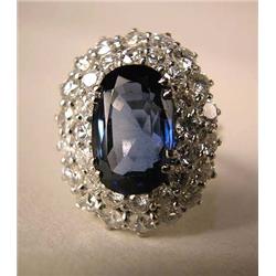 A 14K WHITE GOLD, SAPPHIRE AND DIAMOND RING Compr