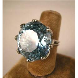 AN AQUAMARINE AND 14K WHITE GOLD RING With a round mixed cut aquamarine, weighing apx. 28.66 carats 