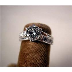 ONE DIAMOND AND PLATINUM ENGAGEMENT RING With a c
