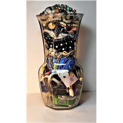 19)  LARGE GLASS VASE CONTAINING