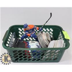 BASKET WITH HOCKEY CARDS, SHELDON SOURAY FIGURE.