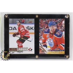 2 FRAMED CONNOR MCDAVID CANVAS INSERT CARDS.