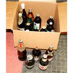 BOX OF UNOPENED VINTAGE BOTTLES OF BEER.