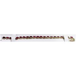 30) 10K YELLOW GOLD RUBY AND DIAMOND BRACELET,