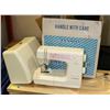 Image 1 : JANOME SEWING MACHINE WITH CABINET.