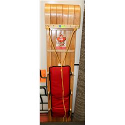 TOBOGGAN WITH PADDED SEAT.