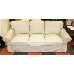 3 PERSON BEIGE FABRIC 84" COUCH.