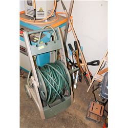 HOSE CADDY WITH HOSE AND ASSORTED YARD TOOLS