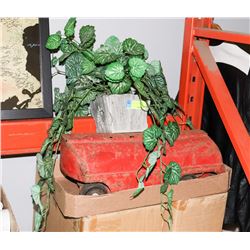 ARTIFICIAL PLANT SOLD WITH VINTAGE METAL TOY