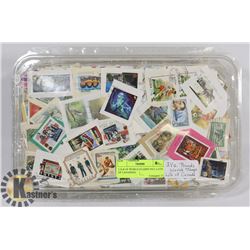 2.5LB OF WORLD STAMPS INCL LOTS OF CANADIAN.