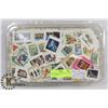 Image 1 : 2.5LB OF WORLD STAMPS INCL LOTS OF CANADIAN.