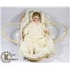Image 1 : BEBE 1988 PORCELAIN & FABRIC DOLL WIN WICKER CRIB