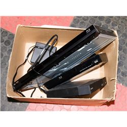 BOX WITH 2 DVD PLAYERS AND ONE BLUE RAY PLAYER AND