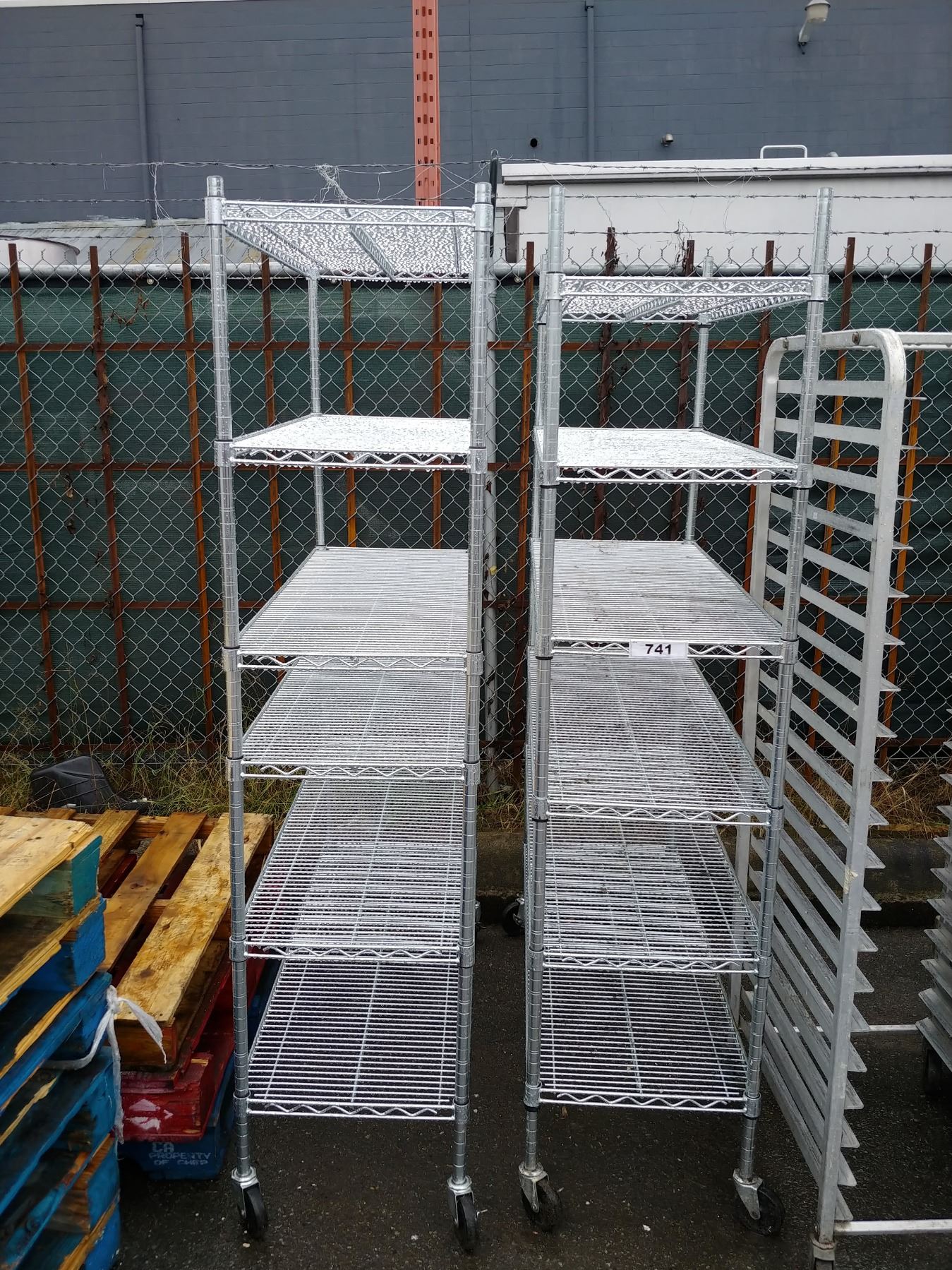 PAIR OF METAL ROLLING RACKS